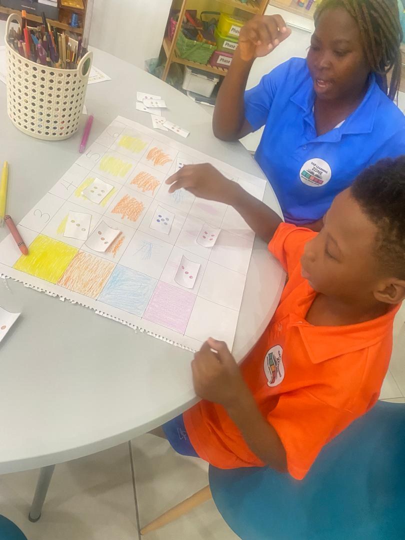 Child working through a learning activity with a GAP Learning Zone tutor